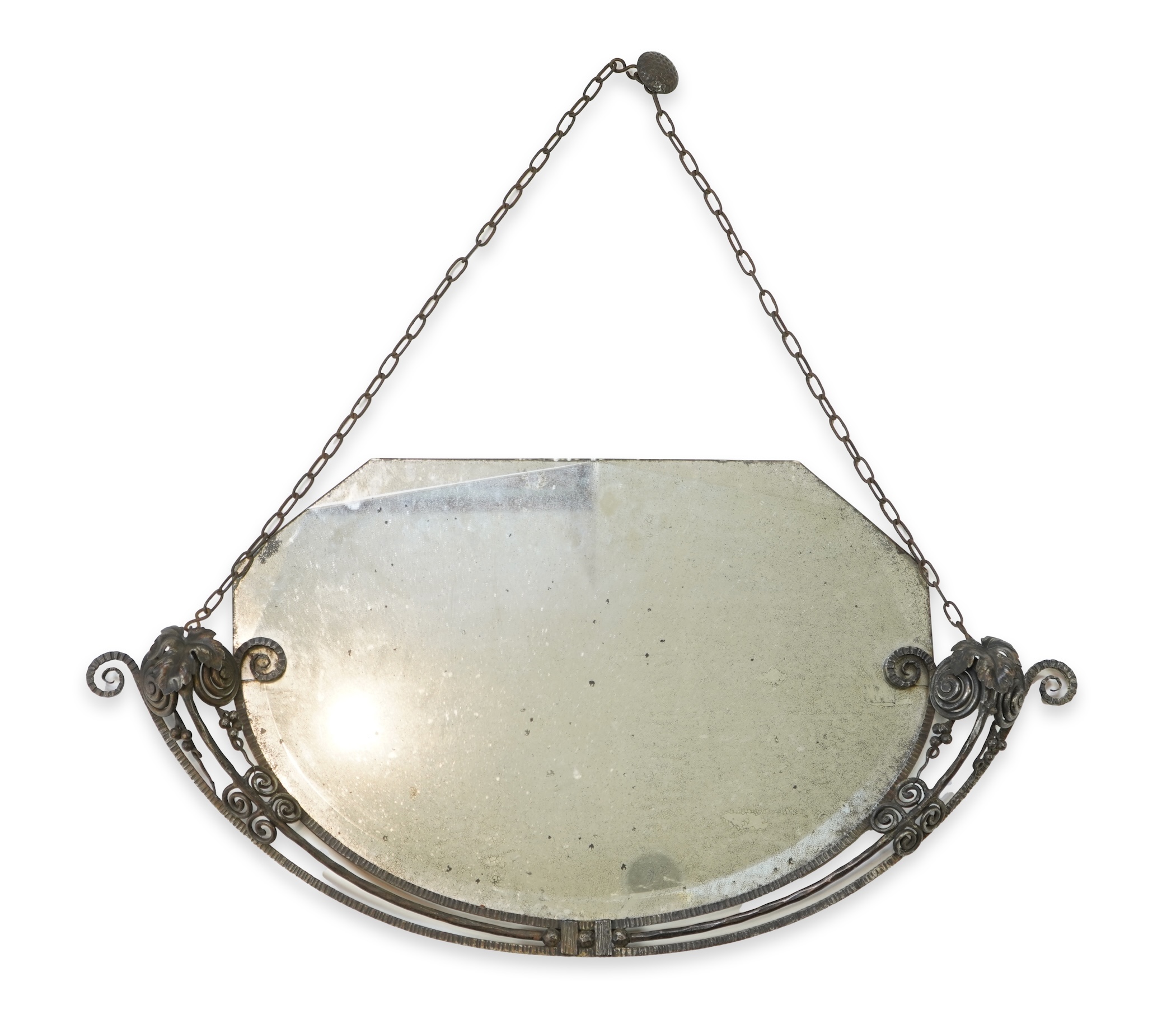 Manner of Edgar Brandt (French, 1880-1960): An Art Deco style wall mirror